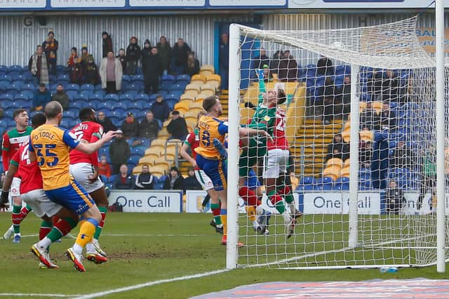 Goalmouth action during Mansfield Town's clash with Walsall this afternoon. Photo by Chris Holloway / The Bigger Picture.media
