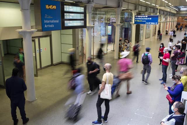 Passengers arrive at St Pancras International station after the Government announced it was imposing a 14-day quarantine period for people arriving from France (Photo by John Phillips/Getty Images)