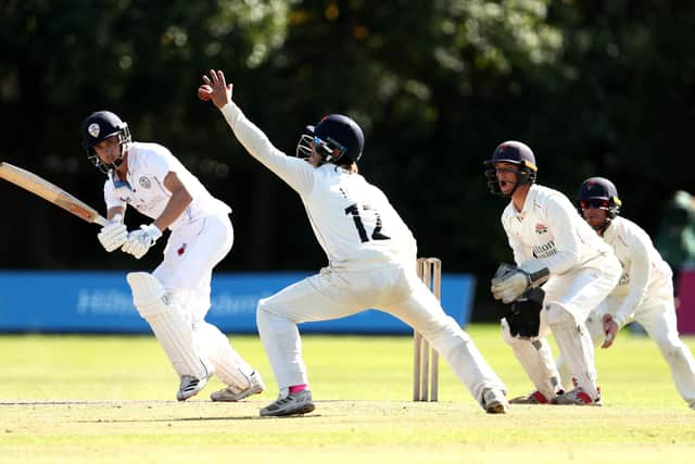 Harvey Hosein  bats with Rob Jones of Lancashire fielding during day 4 of the Bob Willis Trophy match between Lancashire and Derbyshire. (Photo by Jan Kruger/Getty Images)