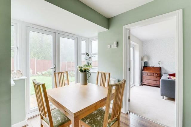 Within the kitchen diner, there is ample space for a dining or breakfast table -- in front of double French doors that lead out to the back garden.