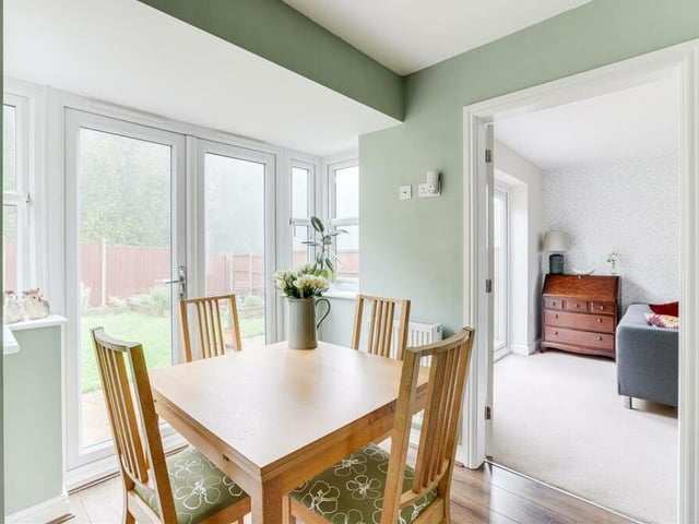 Within the kitchen diner, there is ample space for a dining or breakfast table -- in front of double French doors that lead out to the back garden.