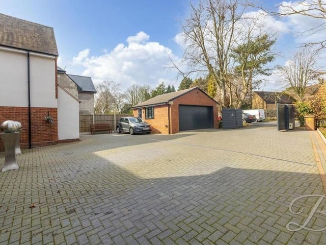 Our last photo of the Lichfield Lane house shows the detached garage, which is a good size.