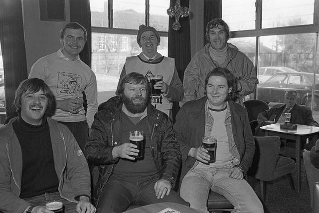 A sponsored walk in December 1979, pictured are walkers drinking their well-deserved pint at the finish at the welfare.
