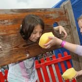 Friends Julia Kowalczyk and Freya Strouther enjoyed lots of sponge-throwing fun in the stocks at the big Mansfield Day event last Saturday. Now check out our guide to what to do and where to go on this, the last weekend before the end of the school summer holidays,