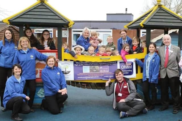 Staff, children and the then MP Dennis Skinner celebrate Woodhoots Langwith Junction Childcare nursery's 'Outstanding' rating from Ofsted five years ago.