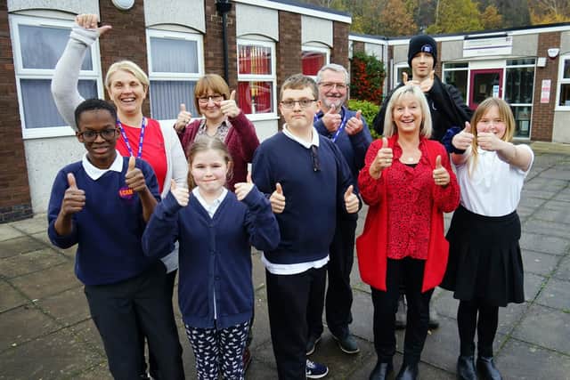 Pupils and staff at Dawn House School celebrate their good Ofsted rating with principal Jenny McConnell.