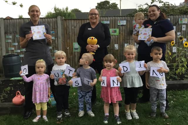 Staff and children celebrate the outstanding Ofsted report at Busy Bees' Treetops nursery in Clipstone.
