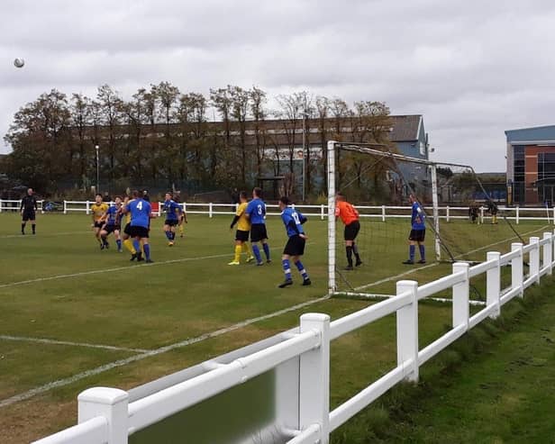 Action from SJR Worksop's defeat to Dinnington in front of 180 fans.