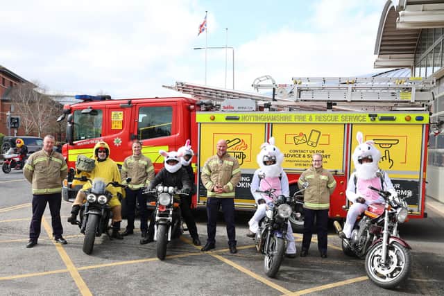 Team members at Mansfield Fire Station pictured with bikers in Easter fancy dress. Photo: Paul Horton.