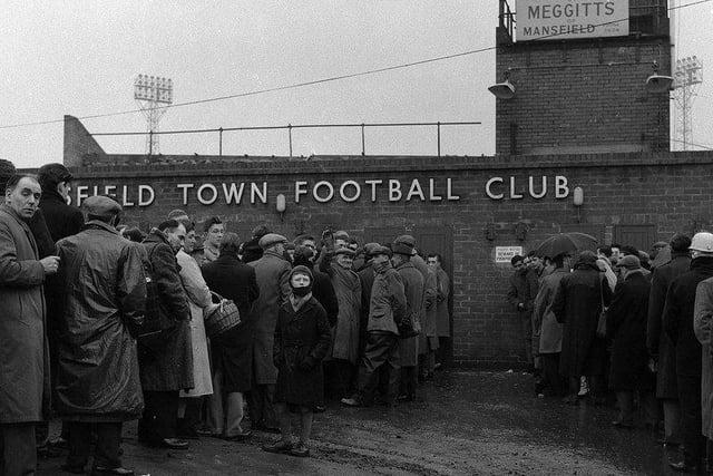 Fans queue to get into the Field Mill ground in 1962.