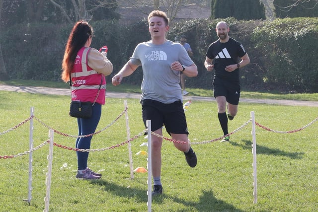 Delight and relief for this runner as he crosses the finishing line at Manor Park. In the 416 renewals of the Mansfield parkrun, no fewer than 7,439 personal-best times have been clocked.