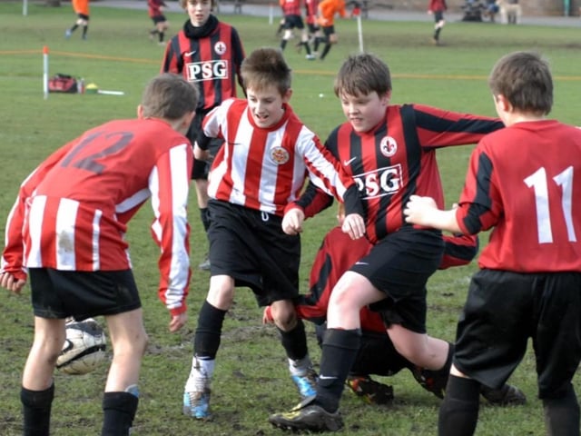 Skegby Colts U13s (red and white stripes) v Manor 4th Black played at Manor School, Mansfield Woodhouse in 2011