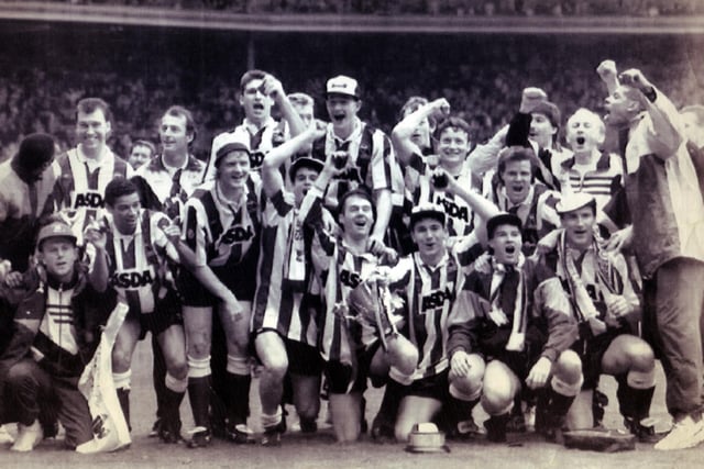 A jubilant Wednesday team celebrate after beating Manchester United 1-0 in the Rumbelows League Cup final at Wembley in April 1991.
