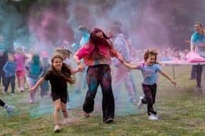 Children and staff having fun at the colour dash. Photo: Lou Brimble