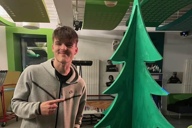 Getting into the festive spirit by painting a specially-crafted Chritmas tree.