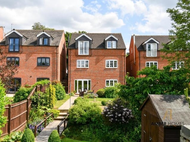 Time to step outside now, and this is a view of the attractive back of the house, showing the large rear garden.