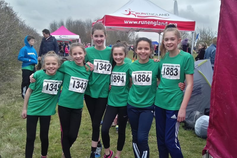 These Harriers girls pose for a pic before racing. Does this bring back any memories for you?