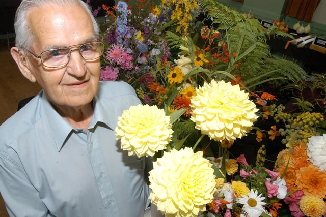 Alf Hall, vice chairman of the Farnsfield Horticultural club with his Dahlia`s at their summer show.