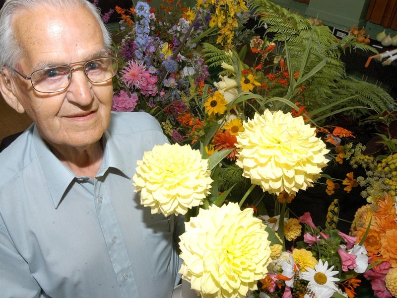 Alf Hall, vice chairman of the Farnsfield Horticultural club with his Dahlia`s at their summer show.