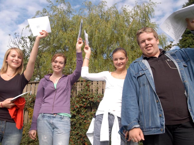 Four of Manor School's pupils celebrate their success in their GCSEs at the school in 2006. Pictured from the left are Jessica Street, Kate Filiman Helen Thornewell and Robert Calladine.