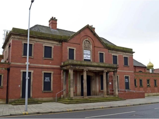 The building is now boarded up and abandoned.