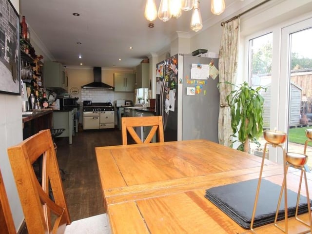 This photo shows how the kitchen opens seamlessly into the dining area.