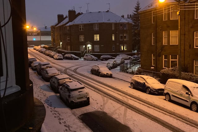 In the early hours of the morning as it was still dark, streetlights shone off the glistening snow in Glasgow's Southside (Photo: Hannah Brown).