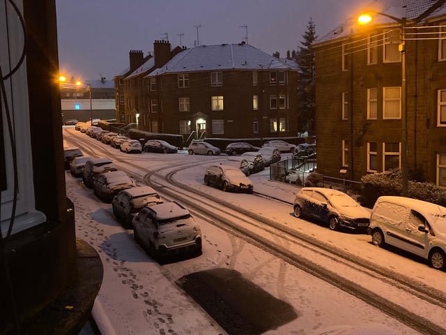 In the early hours of the morning as it was still dark, streetlights shone off the glistening snow in Glasgow's Southside (Photo: Hannah Brown).