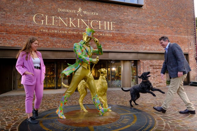 Each Johnnie Walker site hosts its own unique Striding Man statue. The one at the entrance of Glenkinchie features historic distillery dog, Bruce.