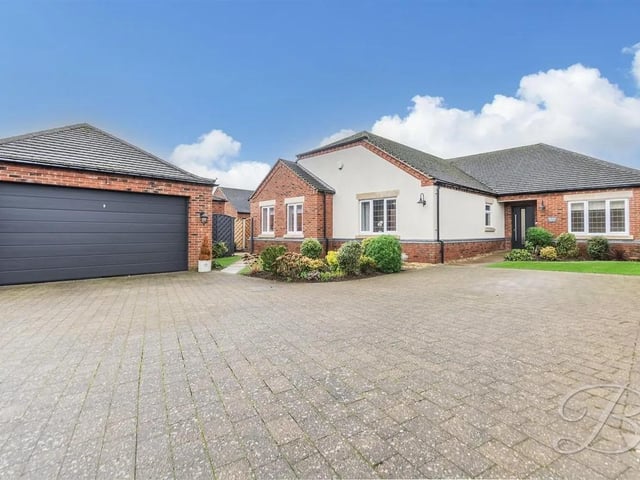 The location is ideal for those seeking a peaceful neighbourhood, offering a delightful outlook while still being close to local amenities.