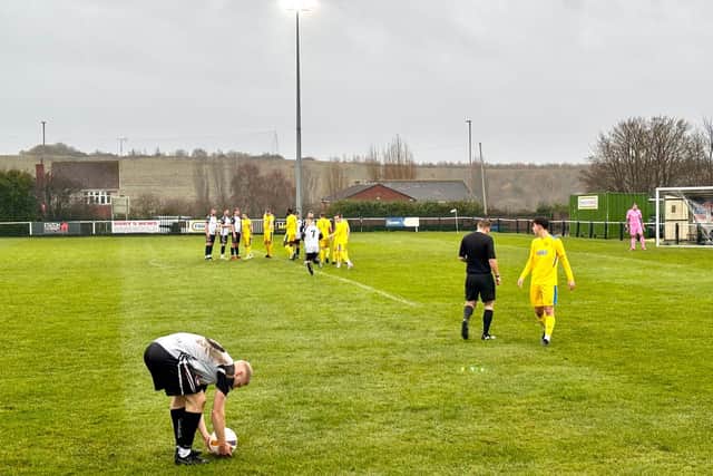 Jamie Bonsor lines up a free-kick during the first half