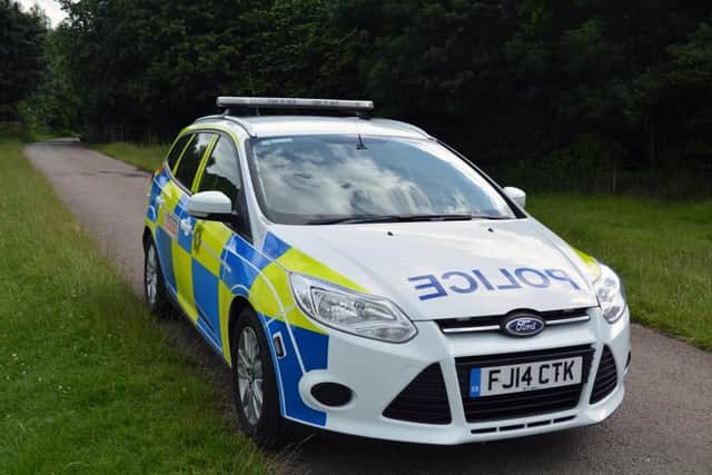 Police officers helped rescue a man from a submerged car which had left the road in Sutton. Photo: Nottinghamshire Police.