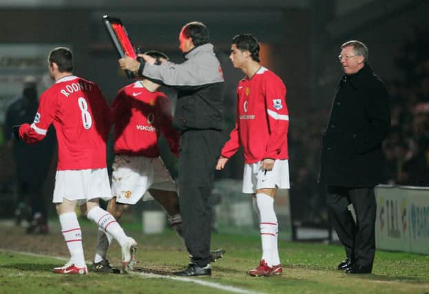 Manchester United bring on Wayne Rooney and Cristiano Ronaldo during the FA Cup Third Round match between Burton Albion and Manchester United on January 8,  2006.  (Photo by Laurence Griffiths/Getty Images)