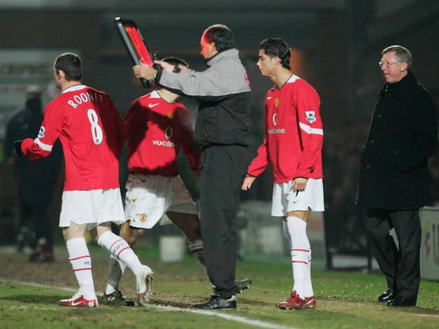 Manchester United bring on Wayne Rooney and Cristiano Ronaldo during the FA Cup Third Round match between Burton Albion and Manchester United on January 8,  2006.  (Photo by Laurence Griffiths/Getty Images)