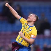 Louis Reed of Mansfield Town celebrates victory following the Emirates FA Cup Fourth Round match between Burnley and Mansfield Town at Turf Moor on February 14, 2026 in Burnley, England. (Photo by George Wood/Getty Images)