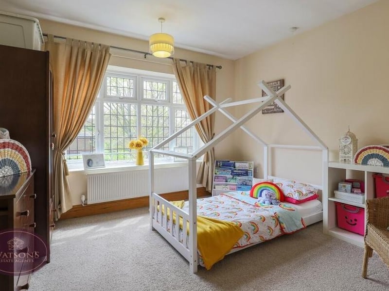 This good-sized bedroom is the ideal den for a young child.