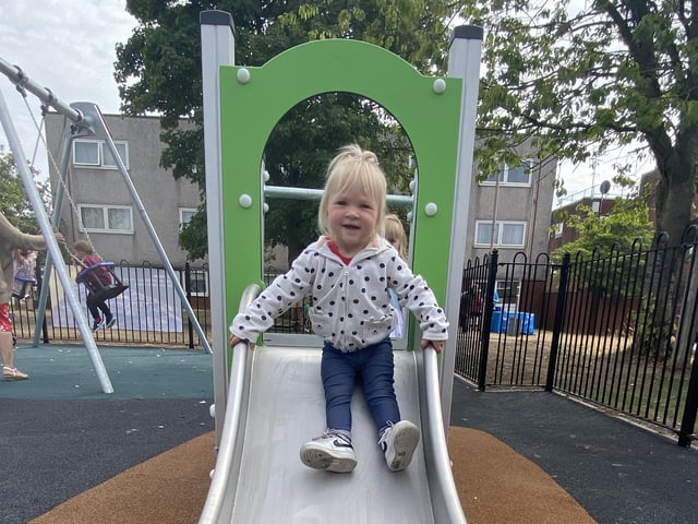 Children try out the new play area