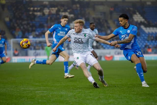 Action during the Sky Bet League One match against Peterborough Utd FC at the Weston Homes Stadium, 26 Dec 2024, Photo credit Chris & Jeanette Holloway / The Bigger Picture.media