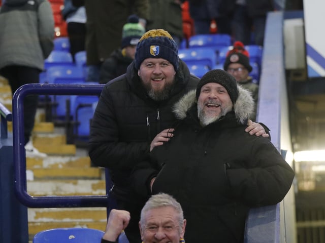 Mansfield Town conceded three times in the final 15 minutes to lose at Bolton Wanderers.