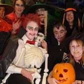 Warsop Co-op Store Manager Callum Flinton, front left, was joined by staff back in 2006 for a Halloween themed charity day to raise funds for 1st Warsop Girl Guides.