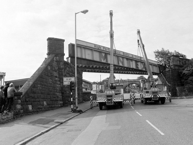 Do you remember when Nottingham Road had railway bridges going over it? This particular bridge, near to the entrance of Titchfield Park, is being removed in August 1970.