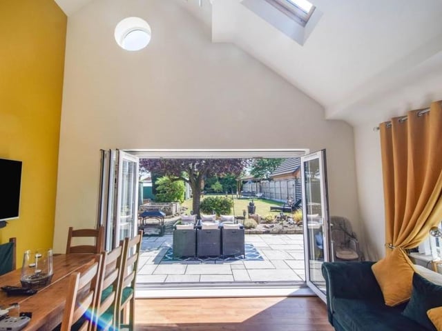 'Come into the garden' is the message these bi-folding doors in the dining area scream to you.