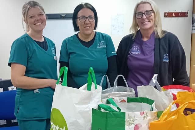 Nichola, Katy, Jackie from Lawrence Vets with staff donations. Photo: Submitted