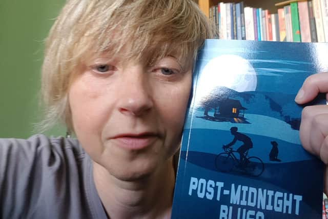 Rae Toon with their new novel