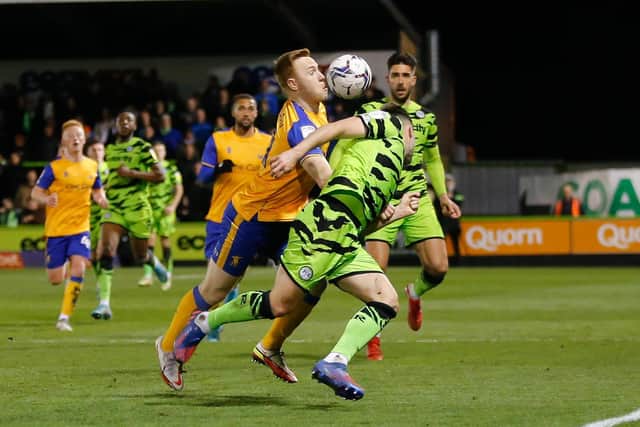 Danny Johnson puts Forest Green under pressure. Photo by: Chris Holloway/The Bigger Picture.media