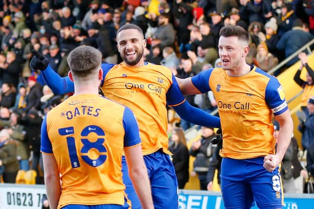 Mansfield Town forward Jordan Bowery celebrates his first half goal, despite Orient protests over handball. Photo by Chris Holloway/The Bigger Picture.media