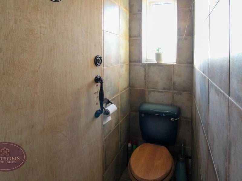 This WC, with ceiling spotlights, is a useful addition to the ground floor at the Selston property.
