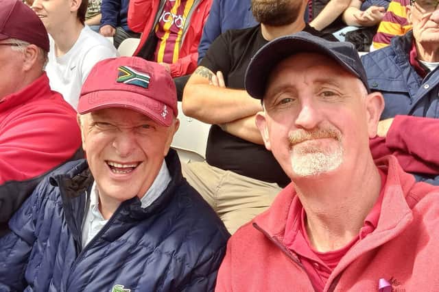 Tony and Richard in the crowd during the game. Photo: Submitted