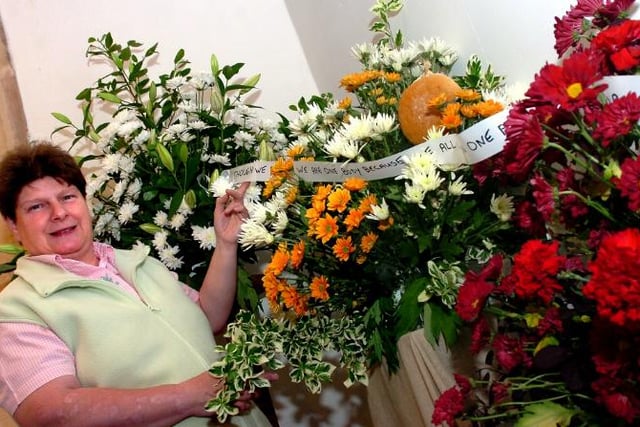 Loversall church turned 800 in 2006. Denise Murden with her flower arrangement.