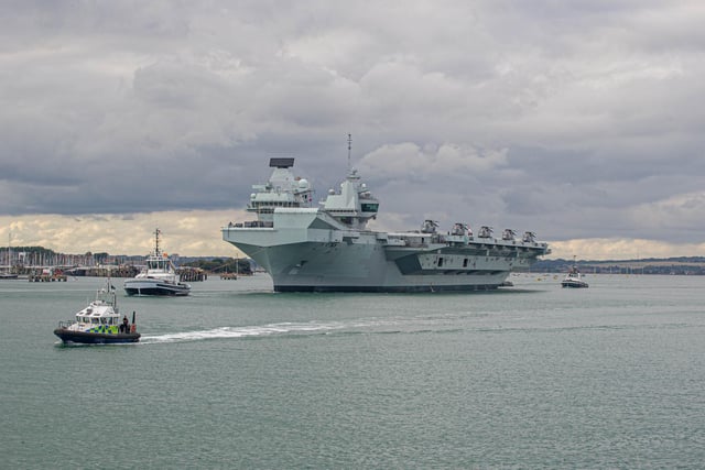 HMS Queen Elizabeth leaves Portsmouth on 9 September 2020. Pictured: View from Still & West Pub, Portsmouth of HMS QE. Picture: Habibur Rahman